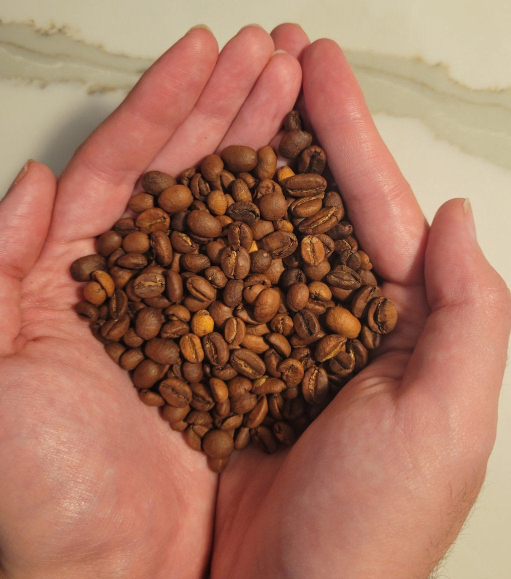 Whole coffee beans for Candy Cane Coffee – Peppermint Vanilla Blend – Medium Roast by Caffeine.EXE